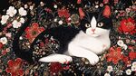 花叢中的黑白貓咪