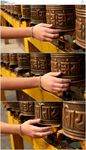 用手抚过佛教寺庙石钟