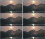 黄昏山脉河边烟囱