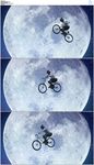 骑自行车飞跃夜空月亮慢动作