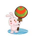插画兔子举着糖果