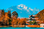 雪山亭子湖水树木摄影图