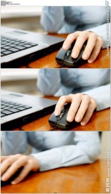 商务人士手指滑动鼠标滚轮