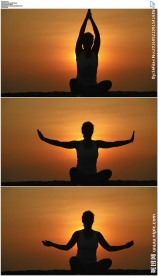 美女面对夕阳练瑜伽冥想剪影