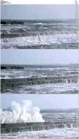 海浪冲击河提形成巨大浪花