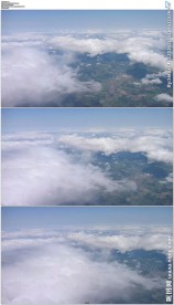 飞机窗外的白云大地蓝天