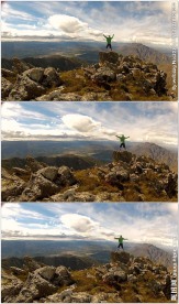 站在山顶展开双臂迎接挑战