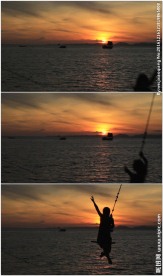 黄昏海面帆船背景荡秋千