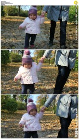 母亲牵着小孩走路