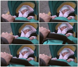 用婴儿车推着宝宝