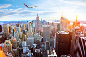 蓝天白云城市建筑飞机背景墙