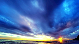 多云夕阳天空海洋