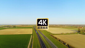 短视频素材航拍田地间的高速公路