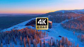 航拍雪山密林中的建筑