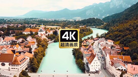 航拍蓝色河流两岸城镇建筑群