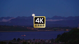 航拍海城市夜空月亮缓缓升起过程