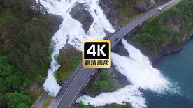 航拍山间瀑布大桥车流