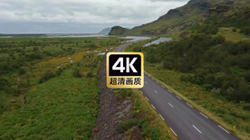 航拍山边乡村道路上汽车