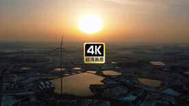 乡村日出晚霞大风车视频航拍