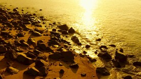 大海海边波澜日出风光4K航拍