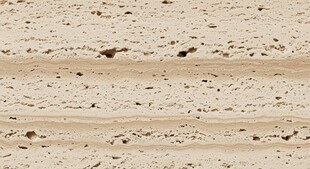 米黄色斑驳纹理石材表面