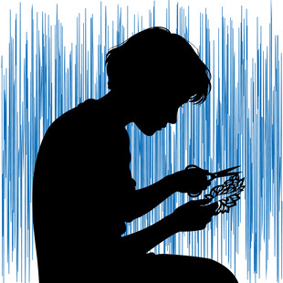 男子专注操作手机剪影